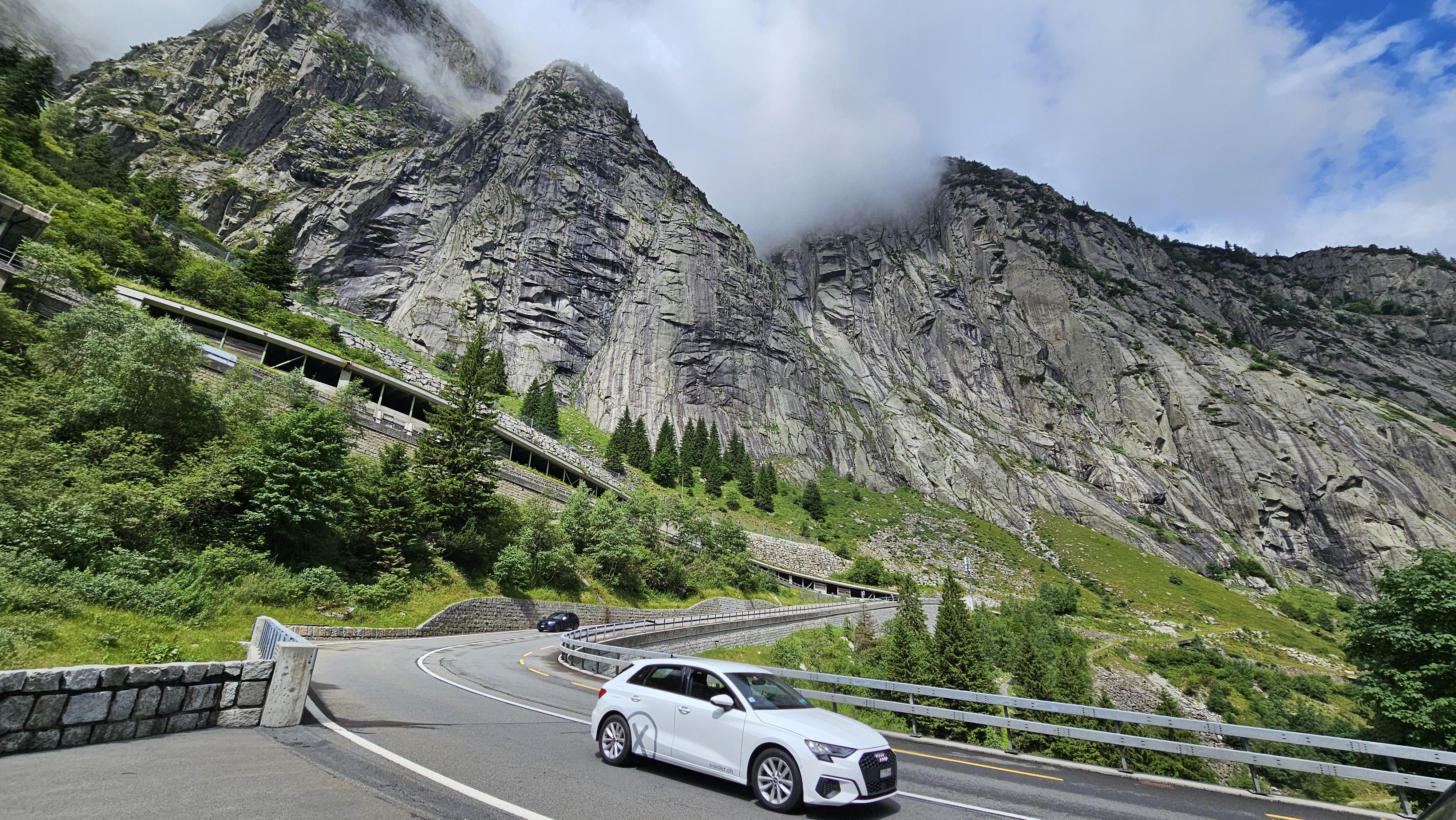 Alpine switchback roads ascending from Italy into Switzerland